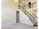 Spacious living area with a staircase and railing, offering views to the upper level at 533 Mount Gerizim Se Rd, Mableton, GA 30126