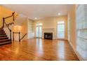 Bright living room features hardwood floors, fireplace, and built-in shelving perfect for entertaining at 774 Piedmont Ne Ave # 11B, Atlanta, GA 30308