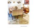 Elegant dining room with a large table, comfortable chairs, and stylish decor at 23 Oxford Ln, Kingston, GA 30145