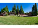 Stone monument at the entrance to The Grove at Hamilton Mill in a picturesque, landscaped setting at 3228 Trinity Mill Cir, Dacula, GA 30019