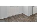 Beautiful and durable wood-look flooring adds warmth and elegance to this home's interior at 390 River Walk Farm Parkway Lot 47, Covington, GA 30014