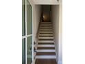Bright entryway featuring stairs with wood treads and a white risers at 445 Firefly Cir # 40, Alpharetta, GA 30009