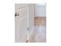 Bright hallway with wood-look floors at 184 Weldon Rd, Mcdonough, GA 30253