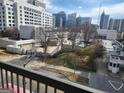 Scenic city view from the balcony overlooking downtown Atlanta at 1075 Peachtree Ne Walk # 506, Atlanta, GA 30309