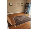 Bright home office featuring hardwood floors, a Persian rug, and ample natural light at 1075 Peachtree Ne Walk # 506, Atlanta, GA 30309