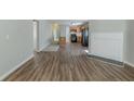 Open concept living space, seamlessly connecting the kitchen, dining, and living areas at 2212 Butner Sw Rd, Atlanta, GA 30331