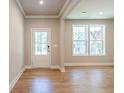 Inviting foyer with wood floors, recessed lighting, and neutral wall colors, enhancing the home's welcoming atmosphere at 4082 Adler Cir, Buford, GA 30519