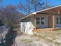 Image capturing the side of the property under construction, highlighting the foundation at 110 Dahlia Nw Ave, Atlanta, GA 30314