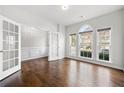 Bright office with hardwood floors, French doors, and lots of natural light from large windows at 667 Creswell Park, Smyrna, GA 30082