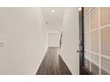 Inviting entryway with a wood-look floor and a view into the home's interior at 310 Silver Moon Drive # 111, Loganville, GA 30052