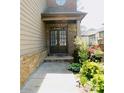 Inviting front entrance with a double door entry and well-maintained landscaping at 5122 Micaela Way, Duluth, GA 30096