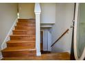 Inviting entryway featuring a staircase and coat closet at 20 Old Oak Ct, Covington, GA 30016