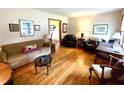 Cozy living room with hardwood floors and comfortable seating at 3556 Forest Hill Rd, Powder Springs, GA 30127