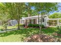 Quaint home with attractive lawn and covered parking at 1325 East Forrest Ave, East Point, GA 30344