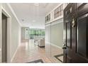 View from the front door showing tile floors, an ornate mirror, and a view to the living room at 23101 Plantation Ne Dr, Atlanta, GA 30324