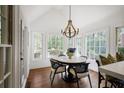 Sun-filled breakfast nook with modern chandelier and window views at 1050 Willeo Ct, Marietta, GA 30068
