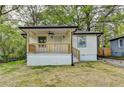 Charming single-story home featuring a covered porch and updated siding at 538 Center Hill Nw Ave, Atlanta, GA 30318