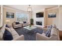 Cozy living room featuring a fireplace, comfortable seating, and stylish decor at 6404 Brookside Se Blvd, Mableton, GA 30126