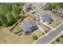 Aerial view of a beautiful home with a large backyard and private pool at 2111 Harmony Dr, Canton, GA 30115