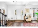 Bright entryway features hardwood floors, white trim, and modern decor at 3522 Evans Ridge Trl, Atlanta, GA 30340