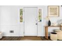 Bright, neutrally-decorated entryway with hardwood floors and modern decor at 3522 Evans Ridge Trl, Atlanta, GA 30340