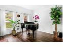 Cozy living room with beautiful hardwood floors and bright natural light at 3522 Evans Ridge Trl, Atlanta, GA 30340