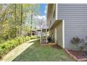 A well-maintained backyard with a stairway to the back deck, offering a serene outdoor space at 3560 Riverchase Dr, Decatur, GA 30034