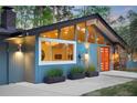 This home offers a modern design with large windows, allowing natural light to fill the interior space at 2895 Dunnington Cir, Atlanta, GA 30341