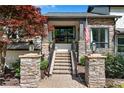 Close-up of the stone-accented front entrance with manicured landscaping at 2750 Interlaken Dr, Marietta, GA 30062