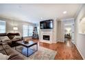 Inviting living room offers hardwood floors, fireplace, and view to bedroom at 505 Bainbridge Dr, Atlanta, GA 30327