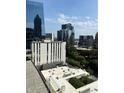 View from the apartment showcasing modern architecture, and surrounding commercial buildings at 1280 W Peachtree Nw St # 2201, Atlanta, GA 30309