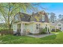 Charming two-story home with a large front yard and inviting curb appeal at 240 Lamon Se Ave, Atlanta, GA 30316