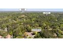 Aerial view of the property and surrounding neighborhood, near Downtown Alpharetta and Wills Park at 12260 Greenmont Walk, Alpharetta, GA 30009