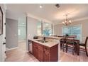 Open kitchen showcasing stainless steel appliances, granite countertops, and light wood floors at 2700 Pine Tree Ne Rd # 4003, Atlanta, GA 30324