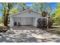Spacious carport featuring a basketball hoop, perfect for recreation at 3795 Willowbrook Dr, Douglasville, GA 30135