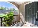 Condominium's inviting front door with sidelight and slate tile porch at 503 Madison Se Ct, Smyrna, GA 30080