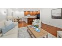 Bright living space featuring hardwood floors, plush seating and an open layout at 503 Madison Se Ct, Smyrna, GA 30080