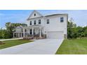 Beautiful two-story home with a welcoming porch, two-car garage, and landscaped front yard at 540 Teversham Dr, Mcdonough, GA 30253