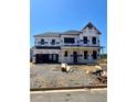 New construction home showcasing the unfinished exterior, framing, and Tyvek weather resistant barrier at 1981 Freestone Way, Marietta, GA 30064