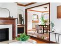 Cozy dining area with modern table set next to an updated living room at 479 Shannon Sw Dr, Atlanta, GA 30310