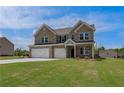 Attractive brick home with a three-car garage and a lush green lawn at 119 Felicity Pike, Locust Grove, GA 30248