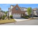 Lovely two-story brick home with a two-car garage and beautiful landscaping in a desirable neighborhood at 518 Coral St, Marietta, GA 30064