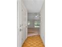 Inviting entryway with wood floors leading to a bright living space at 1220 Paddocks Way, Powder Springs, GA 30127