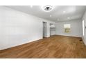 Bright living room featuring hardwood floors and a large window at 1917 Connally Dr, Atlanta, GA 30344