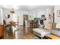 Open-concept design showcases the kitchen and living area with hardwood floors at 1611 Belmont Sw Ave, Atlanta, GA 30310