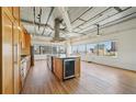 Spacious loft kitchen with an island, stainless steel appliances, and ample cabinet space at 120 Ralph Mcgill Ne Blvd # 1304 & 1305, Atlanta, GA 30308