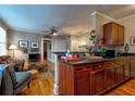 Cozy living room adjacent to the kitchen features hardwood floors and comfortable seating at 741 Frederica Ne St # 8, Atlanta, GA 30306