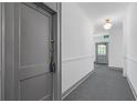 Clean, well-lit hallway with neutral colors and access to apartments at 20 Collier Nw Rd # 11, Atlanta, GA 30309
