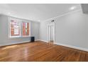 Bright living room featuring hardwood floors and ample natural light at 20 Collier Nw Rd # 11, Atlanta, GA 30309