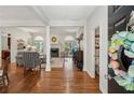 Elegant entryway showcases hardwood floors and open access to the bright and inviting living spaces at 2095 Southers Cir, Suwanee, GA 30024